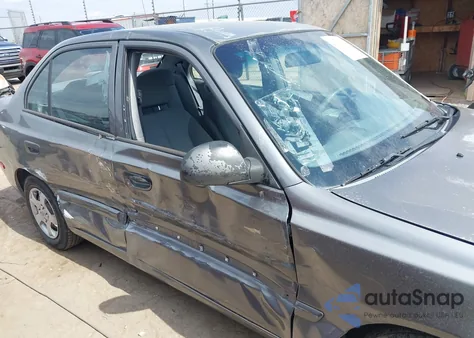 2005 Hyundai Accent Gls z USA, uszkodzony, nr VIN KMHCG45C85U604815